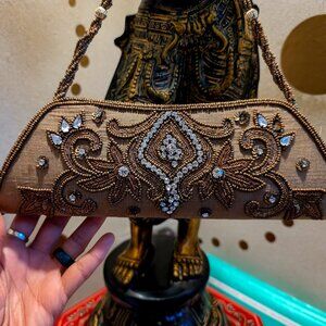 Exotic embroidered clutch